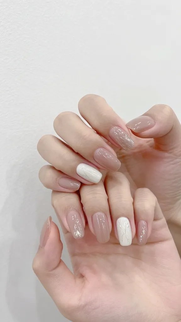 Elegant almond nails on wide nail bed.